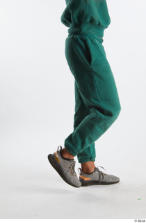 Nathaniel  1 dressed flexing green jogging pants grey sneakers…